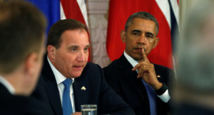 U.S. President Barack Obama listens to Swedish Prime Minister Stefan Lofven speak during a multilateral meeting with Nordic leaders in the State Dining Room of the White House in Washington, U.S., May 13, 2016. REUTERS/Kevin Lamarque